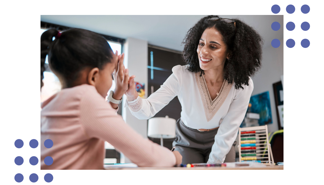 teacher high-fives student
